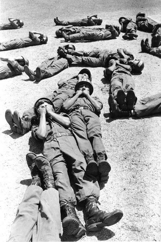 Salvadoran soldiers conduct parachuting exercises, Ilopango, 1983