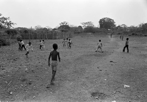 Boys playing in a dirt field, San Basilio de Palenque, 1977