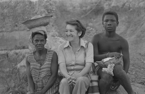 Nina S. De Friedemann and two villagers, San Basilio de Palenque , 1977