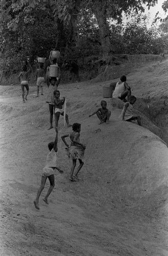 Children playing next to river, San Basilio de Palenque, 1976