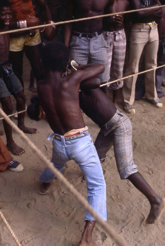 Boys boxing inside ring, San Basilio de Palenque, 1976