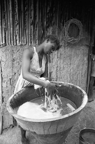 Woman washing clothes, San Basilio de Palenque, 1977
