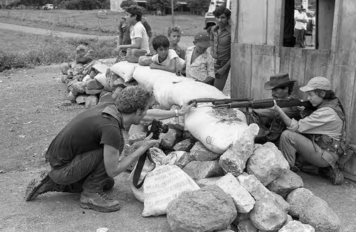 Photographer Harry Mattison composing a photogragh, Nicaragua, 1979