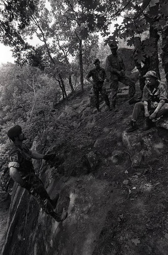 Claflin demonstrates rappelling, Liberal, 1982