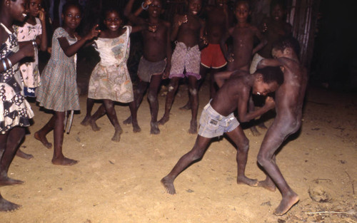 Boys boxing outdoors, San Basilio de Palenque, 1976