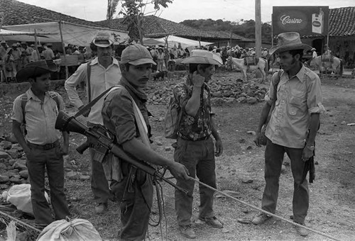 Guerrilleros waiting, Corinto, Morazán, 1983