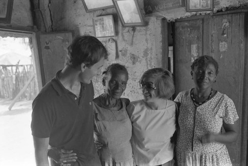 Nina S. de Friedemann, Richard Cross, and two women, San Basilio del Palenque, ca. 1978