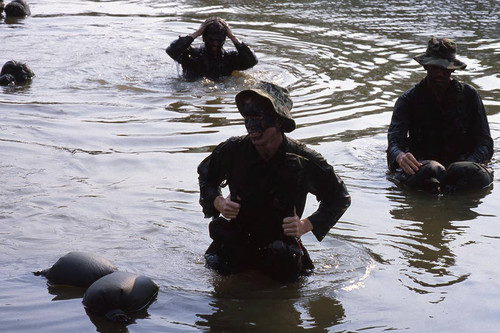 Survival school students in a pond, Liberal, 1982