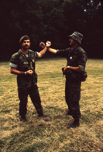 Camp instructor demonstrates combat techniques, Liberal, 1982