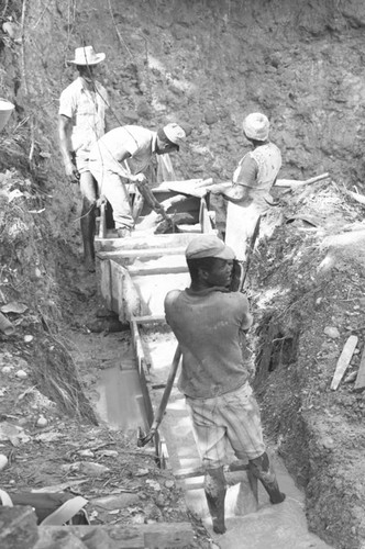 People working, Barbacoas, Colombia, 1979