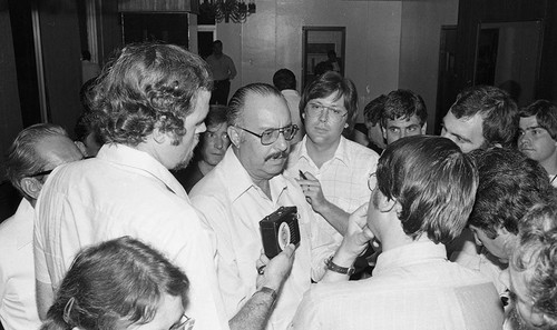 Dictator Anastasio Somoza speaks to a group of people and members of the press, Nicaragua, 1979