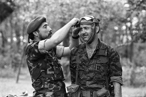 Survival school students learn first aid techniques, Liberal, 1982