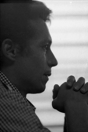 Side profile of Roberto D'Aubuisson with his hands clasped, San Salvador, 1982