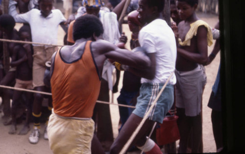 Boxers fighting inside boxing ring, San Basilio de Palenque, 1976