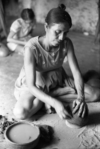 Artisan at work, La Chamba, Colombia, 1975