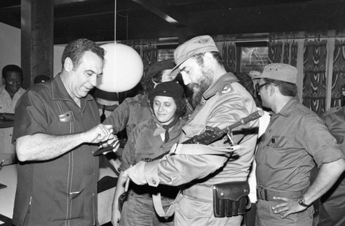 Fidel Castro holds a rifle, Havana, 1980