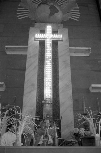 Archbishop Arturo Rivera y Damas offers communion at mass, San Salvador, 1982