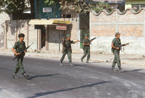 Soldiers patrolling the streets, San Salvador, El Salvador, 1982