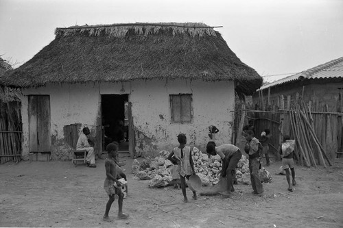 Children transporting rocks, San Basilio de Palenque, 1977