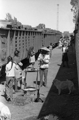 Food vendors at train stop, Mexico, 1983