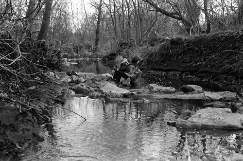 Girls in a creek