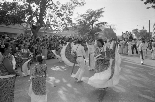 Dancers performing in the street, Barranquilla, Colombia, 1977