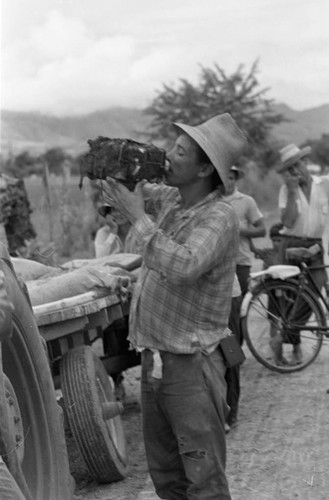 Drinking water, La Chamba, Colombia, 1975