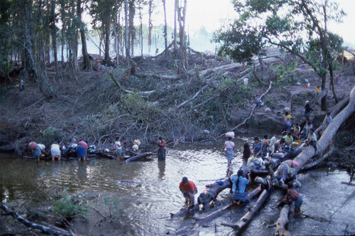 Guatemalan refugees at a river, Puerto Rico, ca. 1983 — Calisphere
