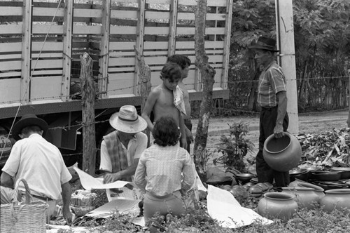 Wrapping clay pieces, La Chamba, Colombia, 1975