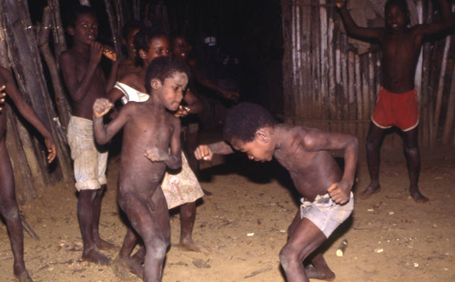 Boys boxing outdoors, San Basilio de Palenque, 1976