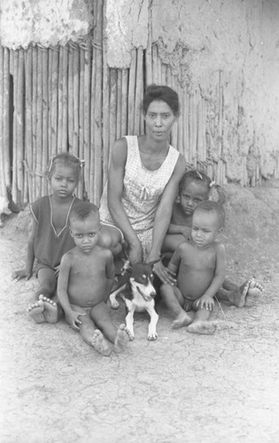 Woman surrounded by children, San Basilio de Palenque, 1976