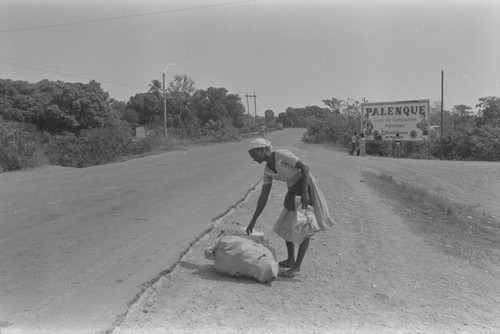 Woman setting up a vendor stand, Cartagena Province, 1977