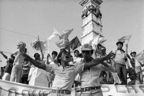 Young man is held while chanting, San Salvador, 1982