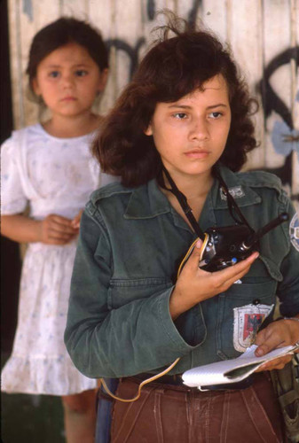 Guerrilla using a walkie-talkie outdoor, San Agustín, 1983