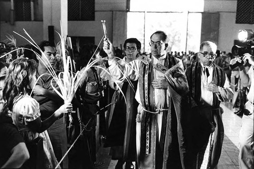 Archbishop Rivera Y Damas sprays holy water, San Salvador, 1982