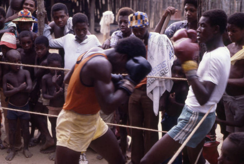 Boxers fighting inside boxing ring, San Basilio de Palenque, 1976