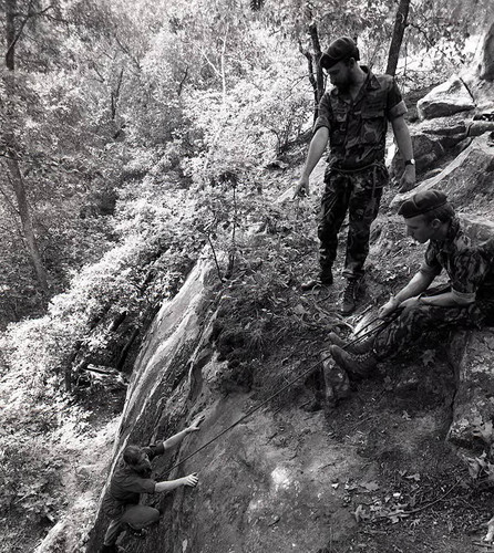 Survival school students learn to rock climb, Liberal, 1982