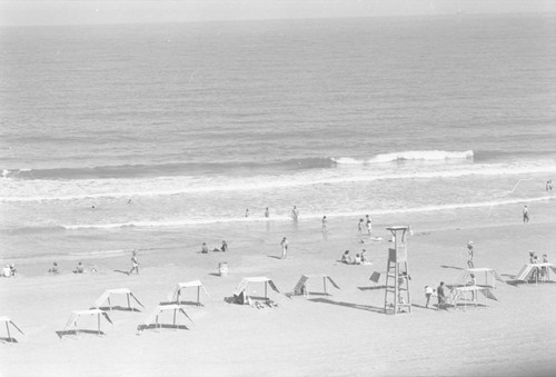 Woman selling fruit at the beach, Cartagena, ca. 1978