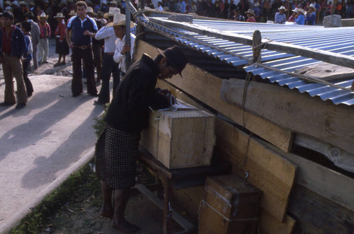 Mayan man filling out his ballot, Nahualá, 1982