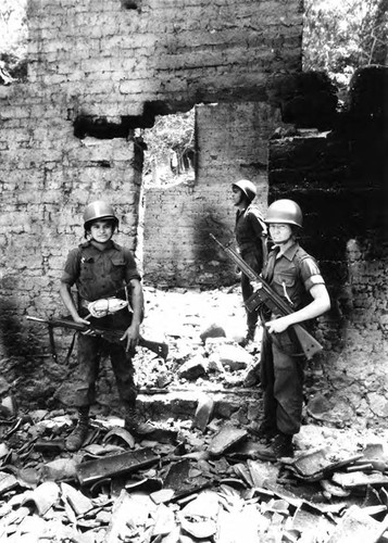 Soldiers inspecting ruins, San Antonio de los Ranchos, Chalatenango, 1981