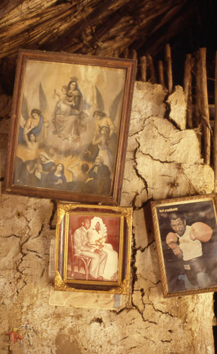 Pictures hanging from the wall, San Basilio de Palenque, 1976