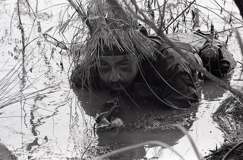 Survival school student practices silent swim techniques, Liberal, 1982