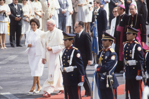 Pope John Paul II walking with President Álvaro Magaña and his wife, San Salvador, El Salvador, 1983