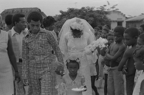 Wedding party walking in the street, San Basilio de Palenque, 1976