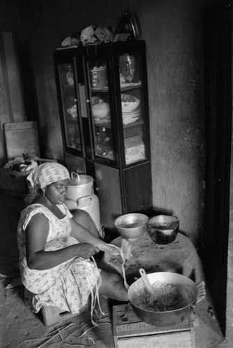 Woman cooking, San Basilio de Palenque, Colombia, 1977