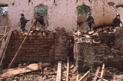 Soldiers inspecting a church, San Antonio de los Ranchos, Chalatenango, El Salvador, 1981