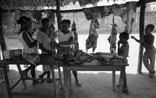 Women selling and buying meat, San Basilio de Palenque, 1976