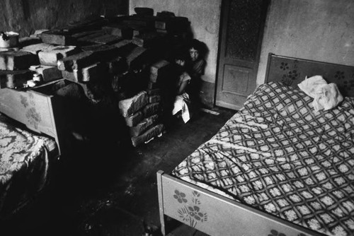 Children hiding in makeshift shelter, Nicaragua, 1979