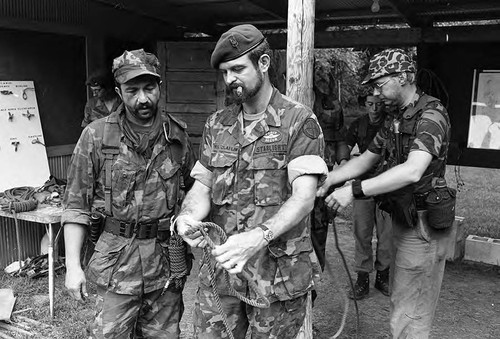 Claflin demonstrates rope tying, Liberal, 1982