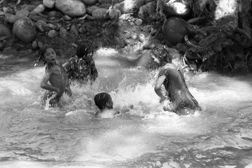 Women and children in river, La Guajira, Colombia, 1976